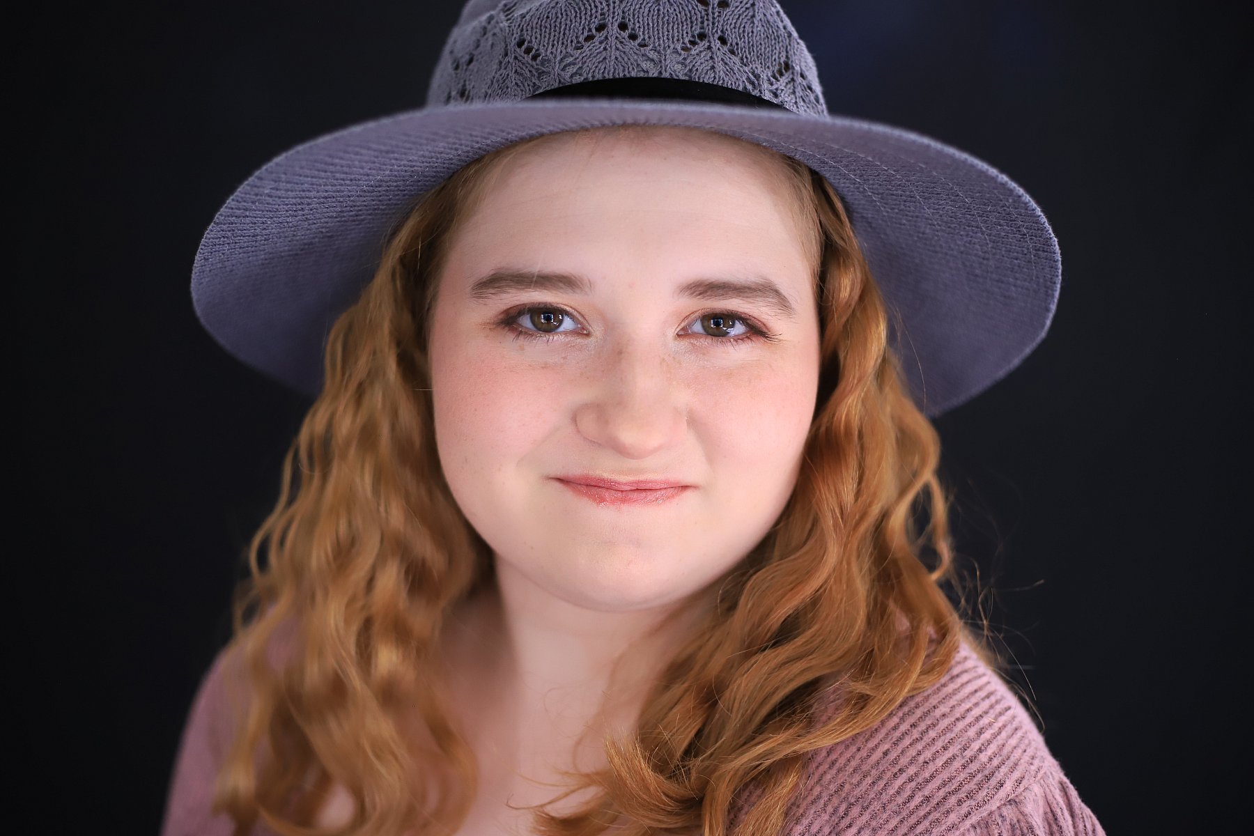 School portrait of Utah teen with hat